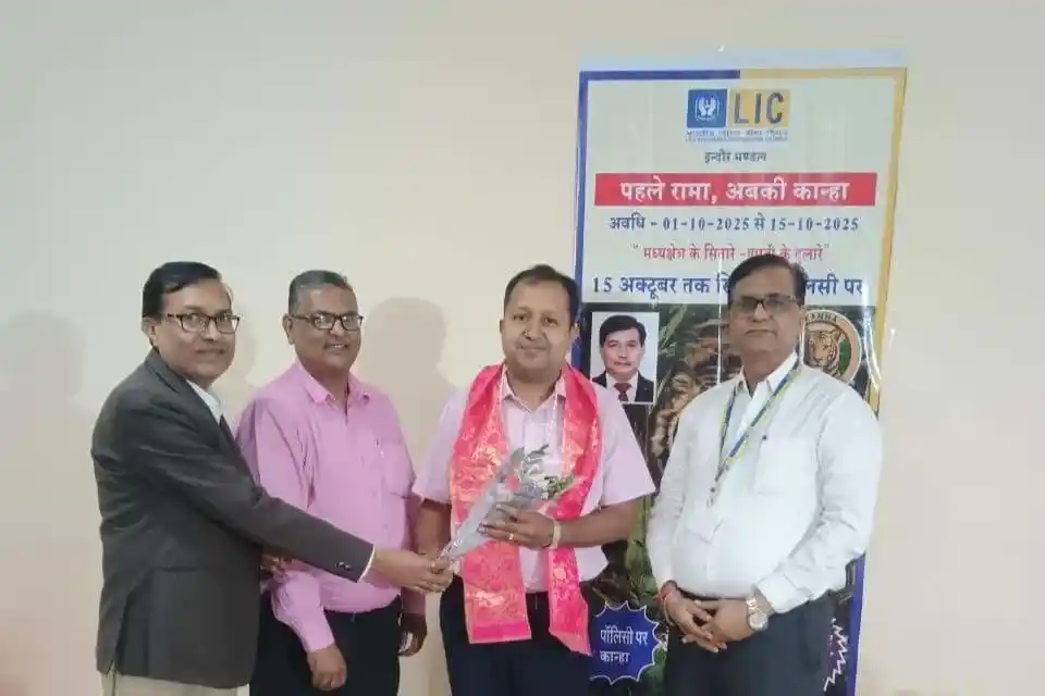 Happy Indian family protected by comprehensive health and life insurance coverage from Sampurn Insurance